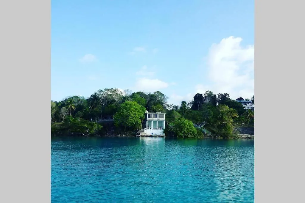 Casa Agua Bacalar / Naajil Ha Villa Mexico
