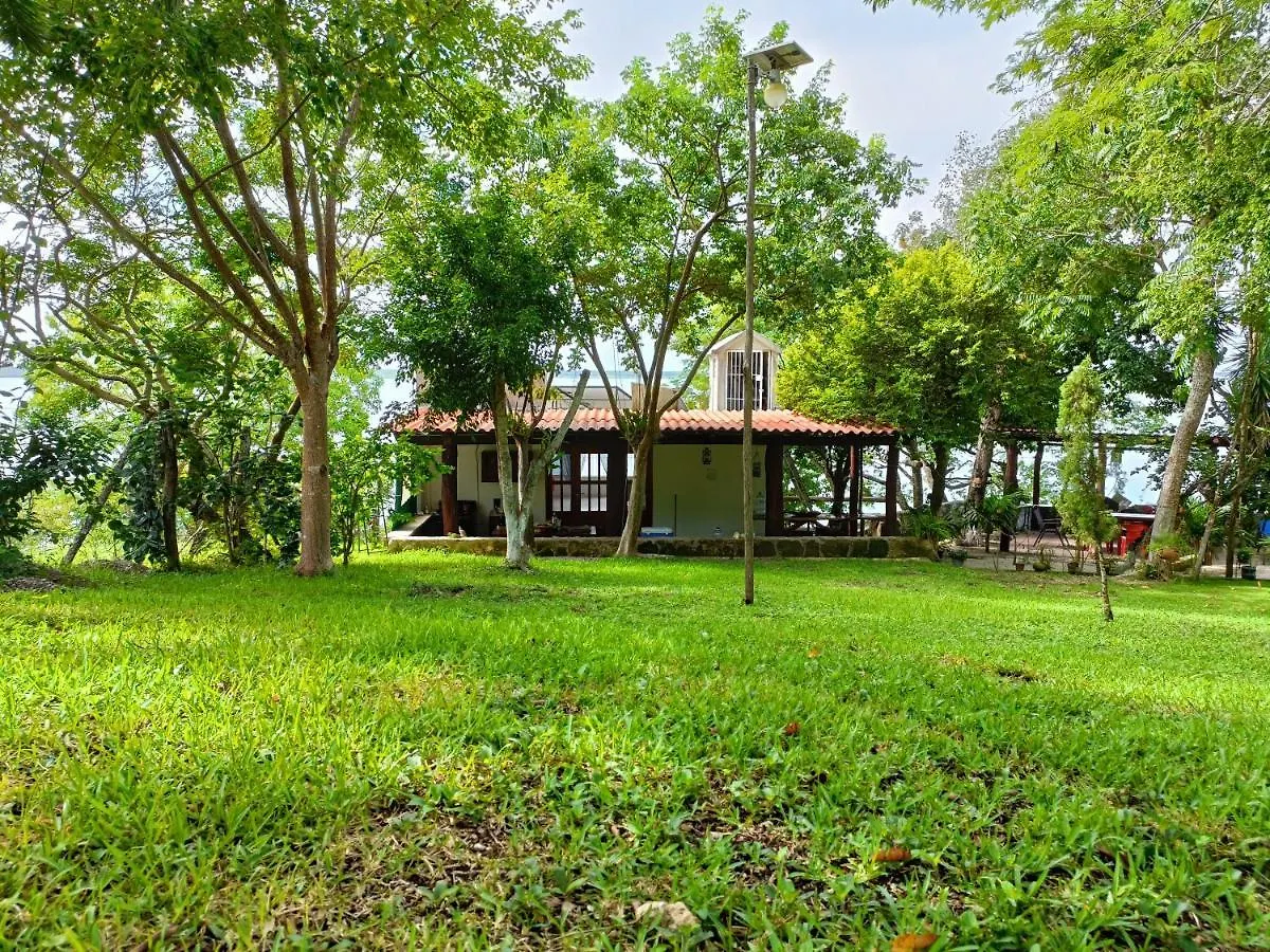 Casa Agua Bacalar / Naajil Ha Villa